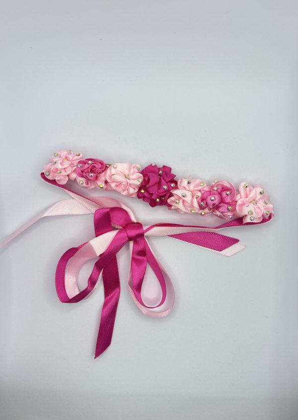 Beautiful handmade mixed of pink flowers blooming Ballet bun wrap