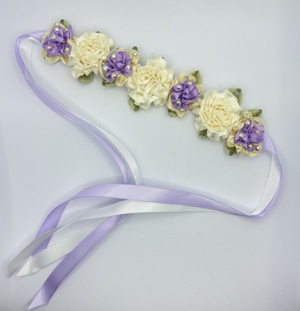 Beautiful handmade mixed of lilac and white flowers blooming Ballet bun wrap